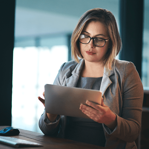 Consultant reviewing workforce data on a tablet